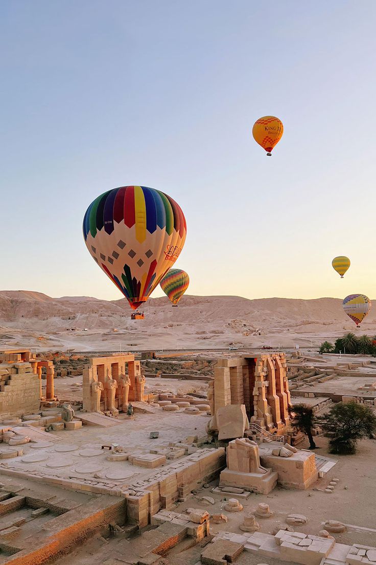 Hot-air balloons floating above Luxor